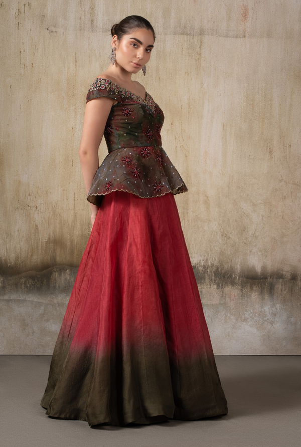 peplum indo western dress Brindha Collection Premium Indo-western Top & Skirt Top: Premium indowestern peplum top featuring intricate yoke and sleeve designs, a stylish high-low peplum cut with sheer transparency. Skirt: Full flared skirt crafted from